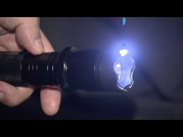Linterna Taser Con Laser Recargable